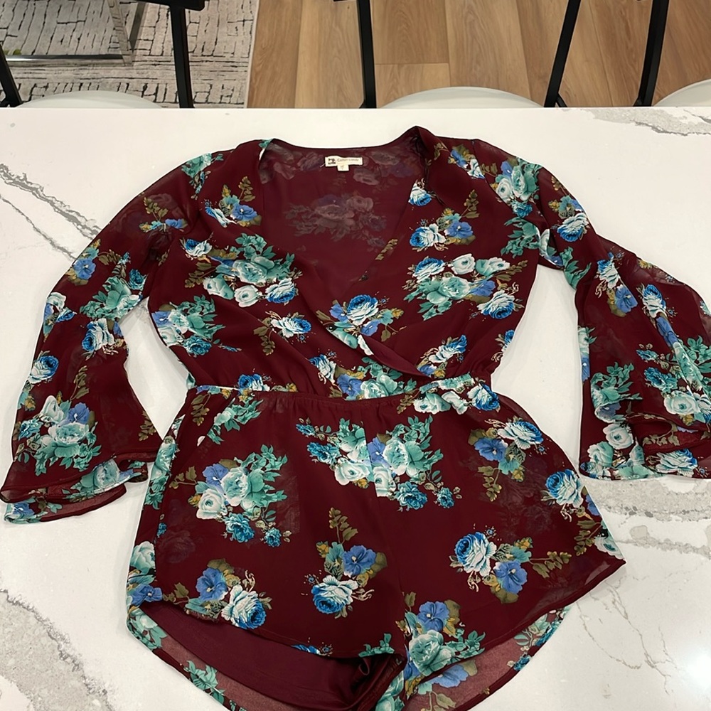 Red and blue floral romper. Sheer sleeves. Size: S